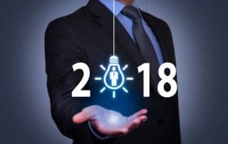 Hand holding an illuminated 2018, HR Trends, PEO, CBR